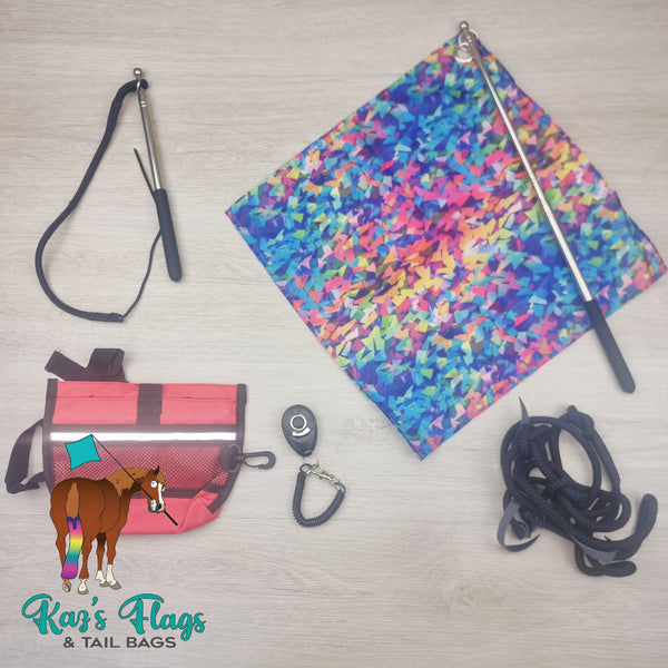 Colorful horse flag and other horse training tools on a wooden surface with Kaz's Flags branding.