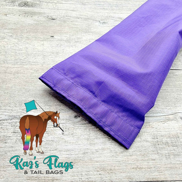 Bottom opening tail bag for easy access