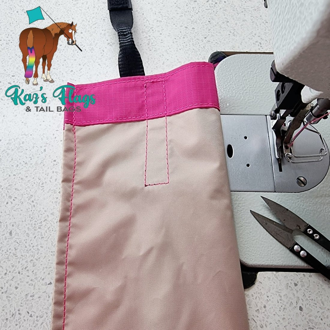 pink tail bag with cream sewn in liner
