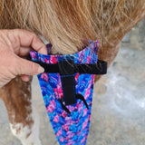 Slim tail bag on a paint horse tail