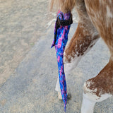 Horse wearing a tail bag