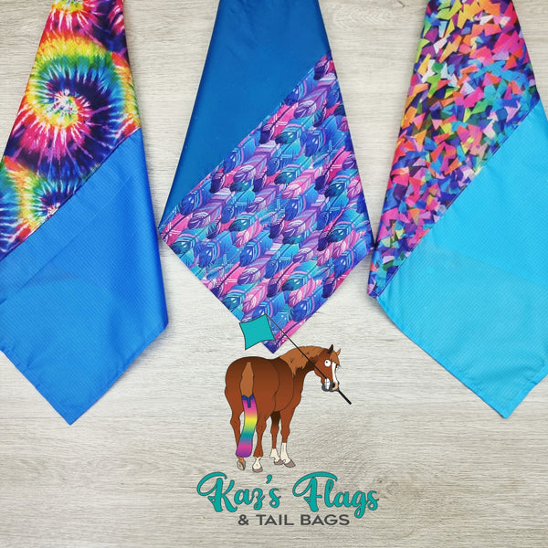 Colorful flags with patterns and a horse illustration on a wooden surface, branded 'Kaz's Flags & Tail Bags'.