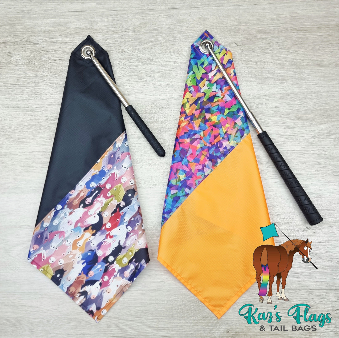 Two colorful flags with patterned designs on a wooden surface, featuring Kaz's Flags & Tail Bags branding.
