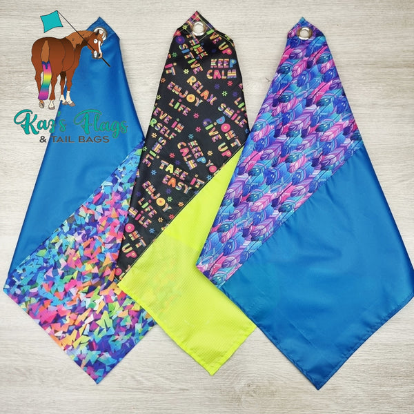 3 colorful horsemanship flags "Fusion Flags" on a wooden surface