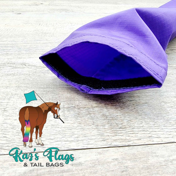 bottom opening tail bag with velcro
