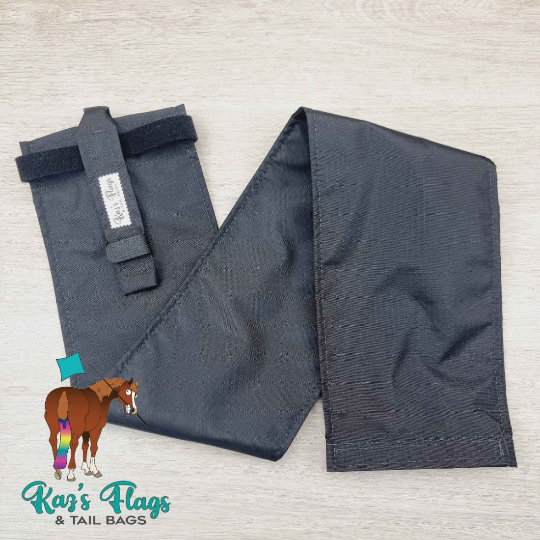 Black Tail bag with bottom opening