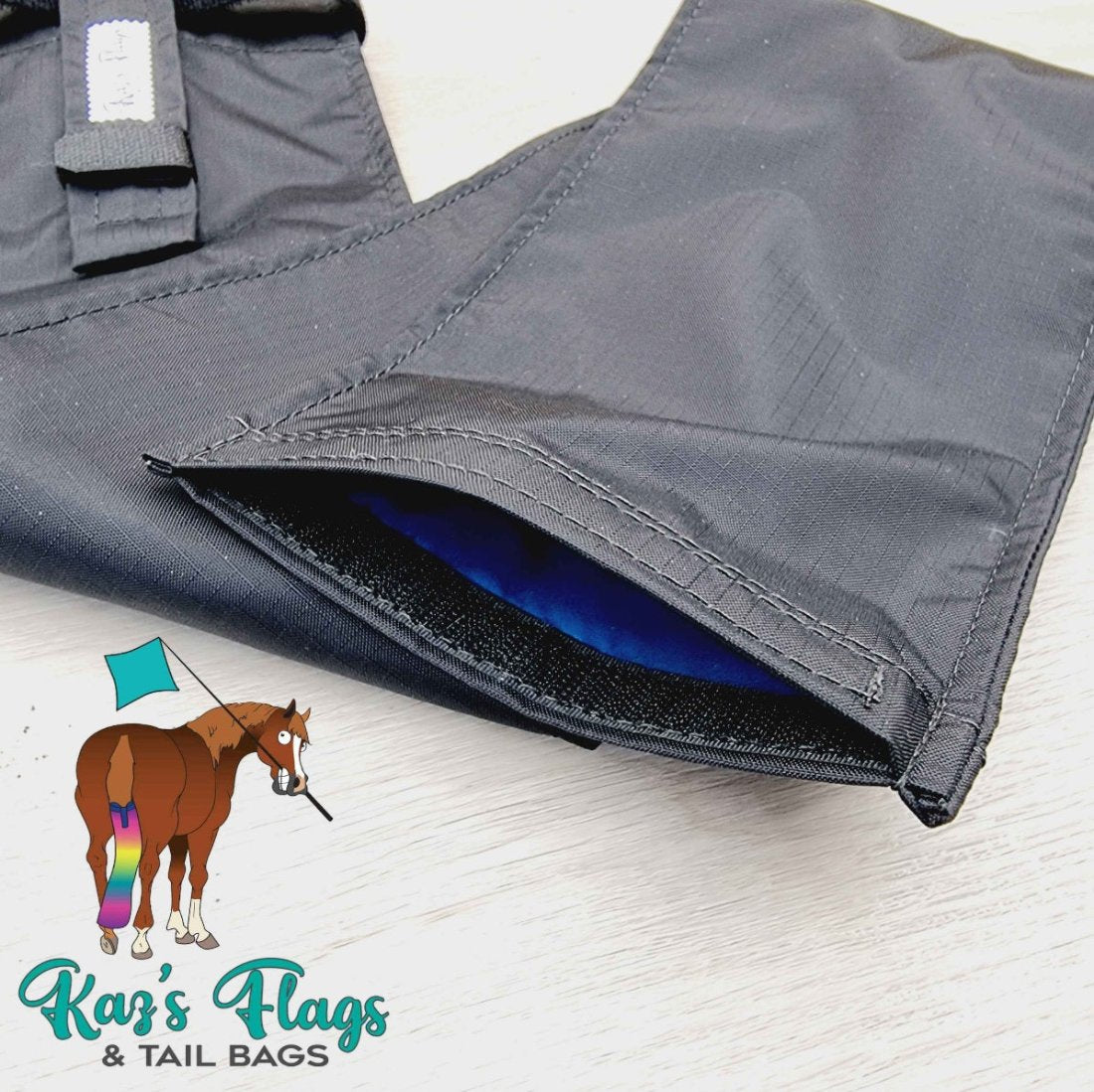 bottom opening tail bag with velcro