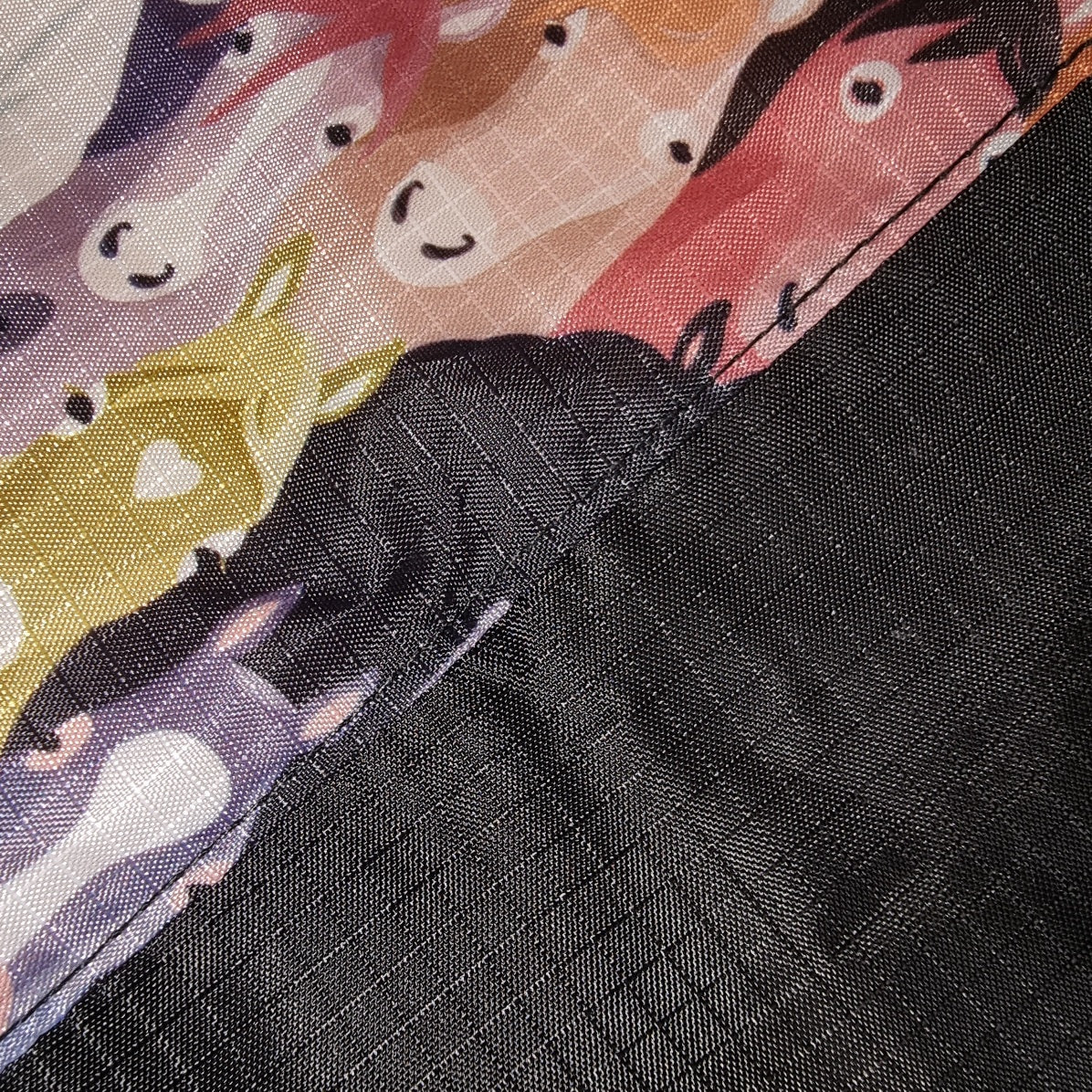 Close up of Printed Ponies and Black Fusion Flag