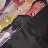 Close up of Printed Ponies and Black Fusion Flag