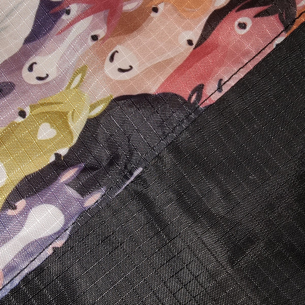 Close up of Printed Ponies and Black Fusion Flag